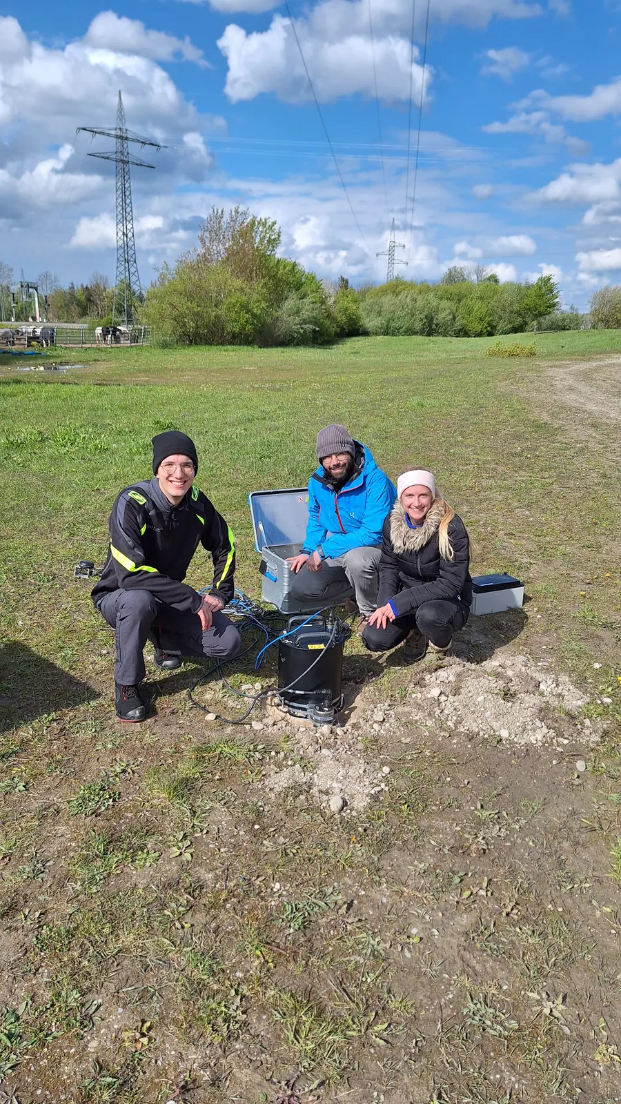 The team checks instruments in the field.