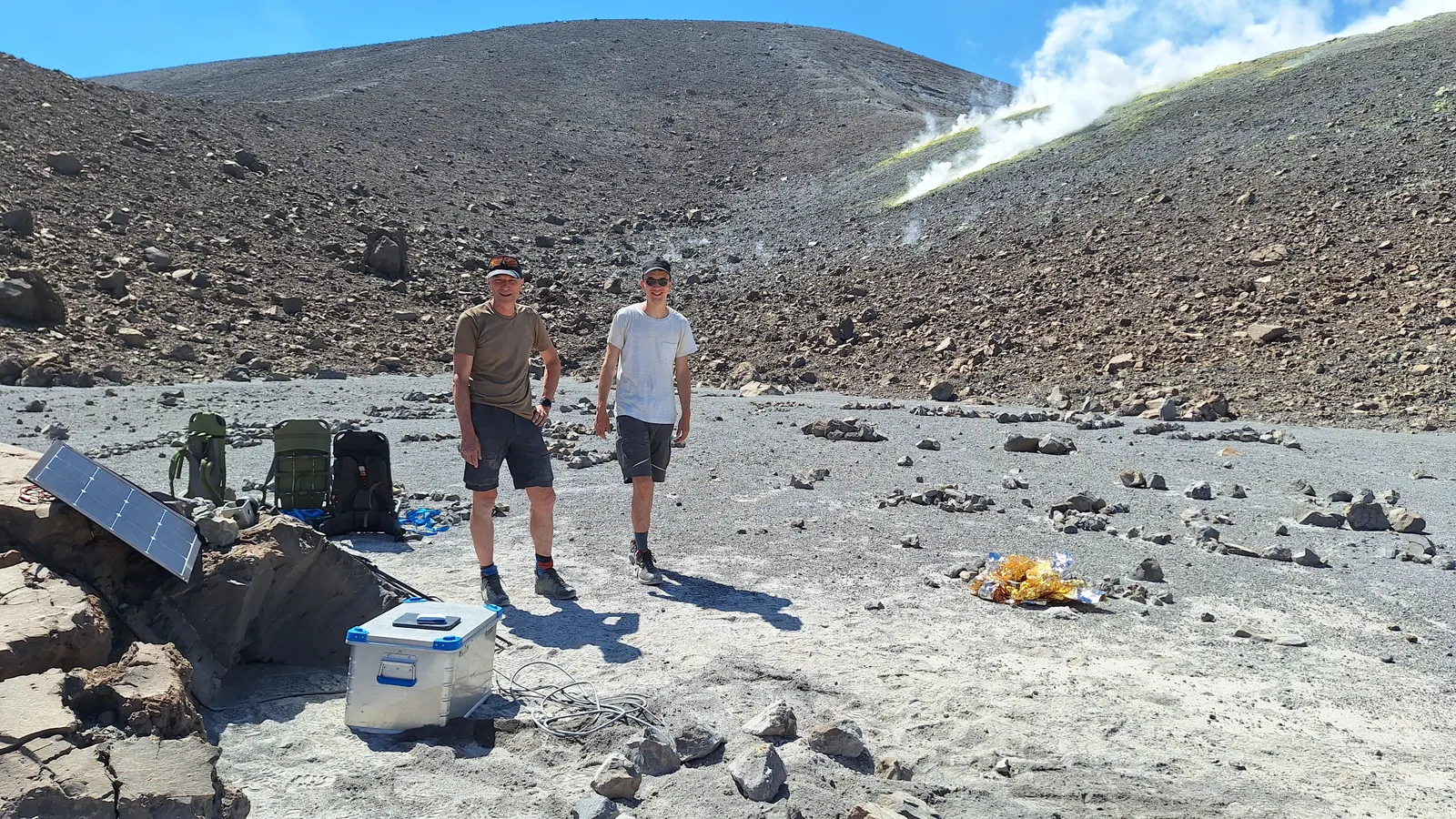 Researchers and equipment in the crater area.